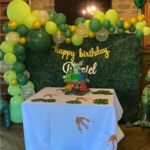Custom-painted dino footsteps table cloth